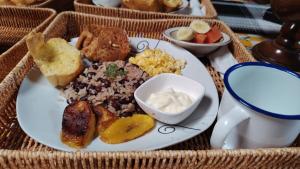 Magic Cabin in Jardín de Dota A real Costa Rican Farm experience with Breakfast included Trout fishing in the lagoon Fruit tasting & beautiful garden with farm animals