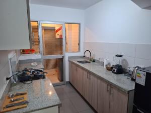 Hermoso departamento cerca a parque y estadio nacional con cochera