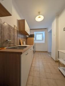 Garden Level Condo With Shady Entrance