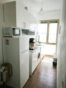 Una Terrazza tra Fiori e Cielo