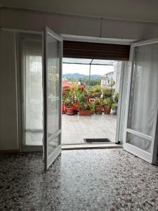 Una Terrazza tra Fiori e Cielo