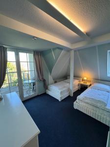 Ferienwohnung im Poolhaus mit Ostseeblick