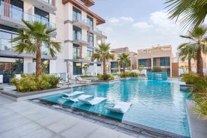 Stylish 1BR Apartment with Pool, Gym & Balcony - JVC Oxford Terraces