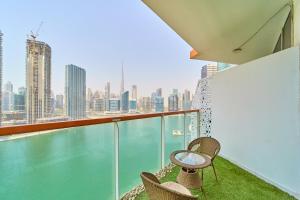 Modern Studio With Iconic Burj Khalifa & Canal Views