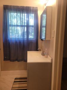 Central located large home on quiet wooded street