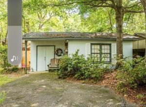 Central located large home on quiet wooded street