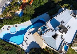 C103 Apartamento com vista lateral para o mar