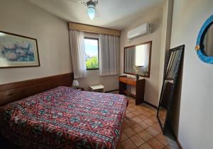 C103 Apartamento com vista lateral para o mar