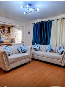 Kofis Cave - 1 bedroom Apartment with Balcony, WIFI, Gym and private Car park near Kisumu Airport
