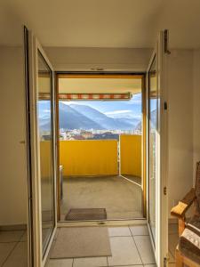 Apartment Above the Rooftops - Mountain Panorama