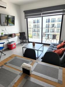 Moderno y comodo Depto con terraza y alberca