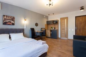 Сучасна студія в центрі - Харківська набережна 3-8