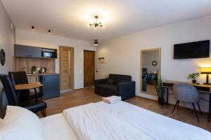 Сучасна студія в центрі - Харківська набережна 3-8