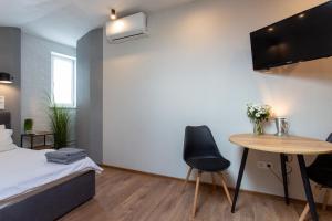 Стильна студія в центрі - Харківська набережна 3