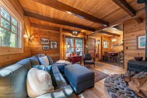 Classic Cabin in the Pines by Tahoe Getaways - Walk to Lake, Pet-Friendly 3 BR w Yard & Hot Tub!