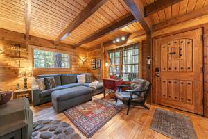 Classic Cabin in the Pines by Tahoe Getaways - Walk to Lake, Pet-Friendly 3 BR w Yard & Hot Tub!