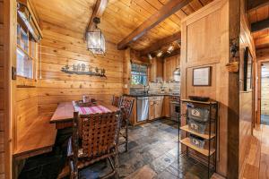 Classic Cabin in the Pines by Tahoe Getaways - Walk to Lake, Pet-Friendly 3 BR w Yard & Hot Tub!