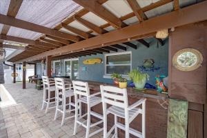 Waterfront Retreat with Pool Tiki Bar & Boat Dock