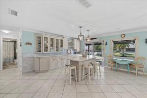 Waterfront Retreat with Pool Tiki Bar & Boat Dock