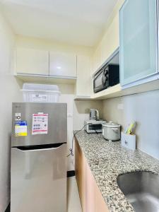 mactan newtown cozy room with wifi and pool access that you can enjoy