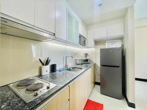 Heart of Mactan Newtown big space with free wifi and pool access