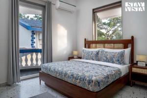 Tarikas Villa - Varca by VEO, StayVista - 3BHK Near Varca Beach with Shared Pool