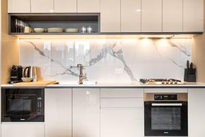 Modern City Views Escape with Gym Access