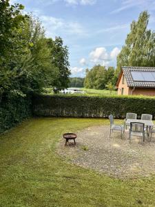 Ferienhaus 5 Sterne am See mit Kamin