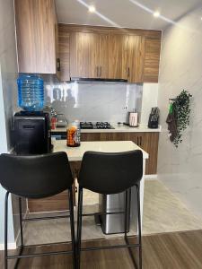 Alba Gardens studio Apt with Gym, Pool & Mini-Mart