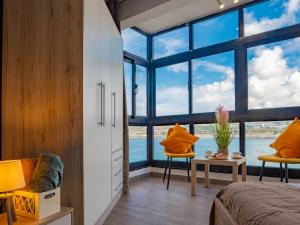 Sunny Beach House with Jacuzzi - Steps from the Sea