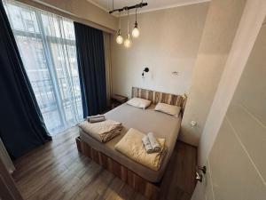 Апартаменты в центре на 2-6 гостей с 2 изолированными спальнями и гостиной