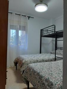Habitación 3 Cama Literas Mixta Castilleja de la Cuesta