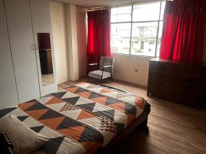 Habitación Céntrica cama Queen Salcedo