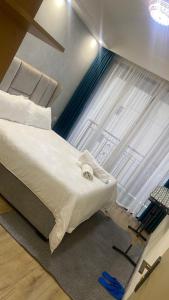 Royal essence apartment with heated swimming pool ,ample parking ,fully equipped gym, child playground and amazing scenic city view