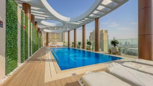 Escape24 Cozy Studio with Infinity Pool in JVC