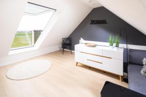 Deichloft - mit Watt- und Hafenblick