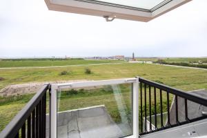 Deichloft - mit Watt- und Hafenblick