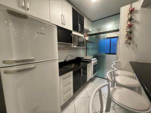 Apartamento grande, com ar condicionado e perto da praia!