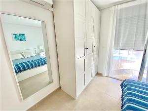 Modern apartment with pool close to the beach.