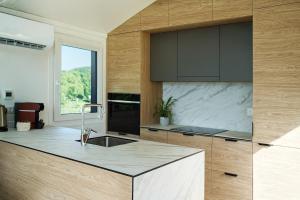 Familienfreundliches Designer Ferienhaus im Grünen an der Grenze zu Österreich I 5 Personen