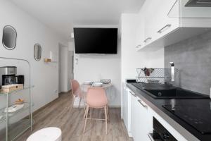 3 appartements de standing côté jardin - sérénité et confort garantis