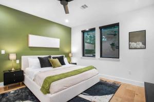 The ATX South Lamar Creekside Retreat with a pool