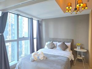 Uptown Parksuites BGC Cosy Hotel Vibe Flat near St Lukes, Uptown Mall, Mitsukoshi and Grand Hyatt - Appartamenti, Manila