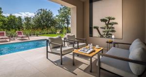 Design Villa Nux with Heated Pool & Secluded Garden