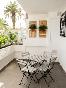 Apartamento con terraza privada, piscina y capacidad para 4 personas