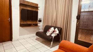 Casa completa com ar-condicionado, Wi-Fi e check-in automático