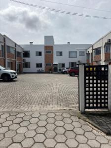 Apartamento com ar-condicionado, Wi-Fi no Campeche e estacionamento gratuito