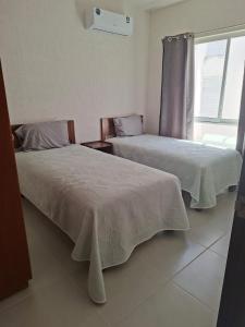Apartment in Playa del Carmen, Pools, Padel, Gym and more