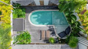 Villa Elita - Modern Stylish 4BR Villa with Rooftop Lounge, 12 Minutes to the Beach - 4hvězdičkové hotely ve městě Kerobokan