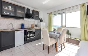 Nice Apartment In Rab With House Sea View 